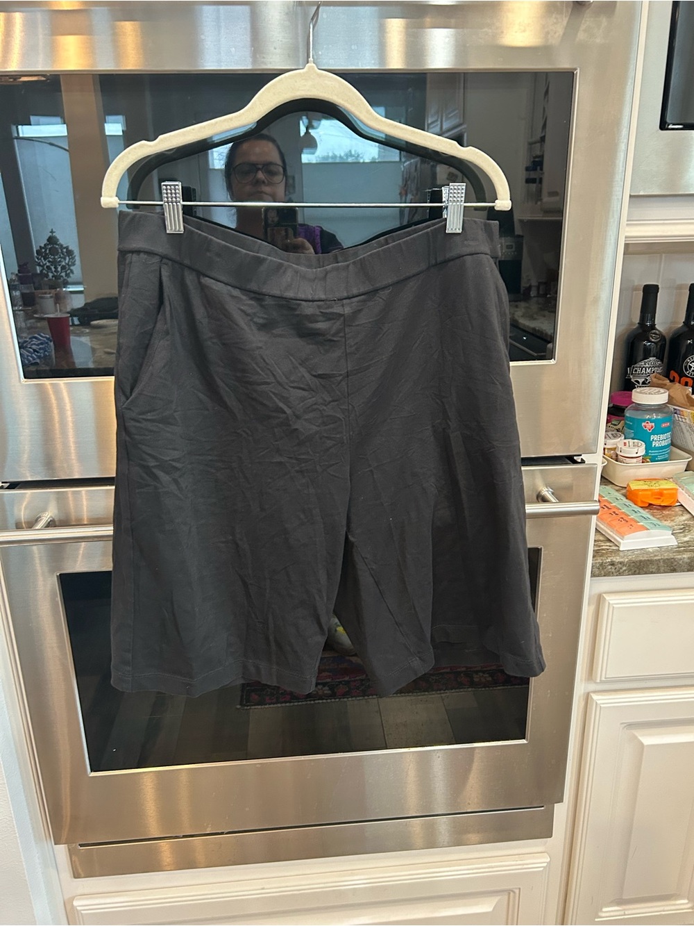 Eileen Fisher Black pull on Bermudas size L slight stains GUC